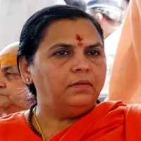 Due to traffice I did not attend Yogi oath taking ceremony says Uma Bharathi