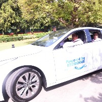Nitin Gadkari visits Parliament in hydrogen-powered car