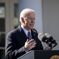 Biden says pandemic not over, gets 2nd Covid booster