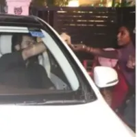 Ram Charan gives money to a beggar woman in Mumbai