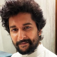 Lady fan pleads Nani for a hug at Tirumala, hero surprised