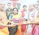 tamilisai Presented silk clothes to seetharama swamy