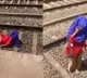 Woman Calmly Talks On Phone As Train Passes Over Her