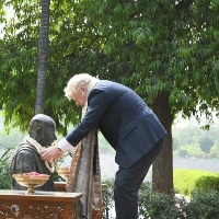 Boris Johnson visits Sabarmati Ashram, tries his hand at spinning on 'Charkha'