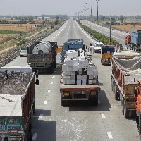 Truck speeds away with toll official clinging to it in Andhra