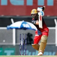 Kohli gains momentum with fifty