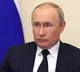 Putin seen limping during Victory Day parade after watching display with a blanket over his lap
