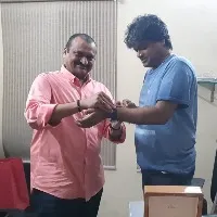 Bandla Ganesh Gifts a pricey watch to Harish Shankar