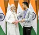 Badminton star Lakshya Sen gives sweet box to PM Modi