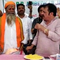 K'taka Cong MLA eats food removed from Dalit seer's mouth, video goes viral