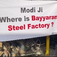 TRS banners with 17 questions greet Modi in Hyderabad