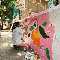 Big B's granddaughter paints wall to highlight menstrual hygiene