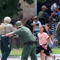 Cops waited outside classroom as students begged for help