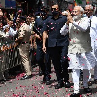 Modi breaks security protocol to accept mother's portrait in Shimla