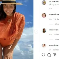 Anushka Sharma shares pics in orange swimsuit as she clicks herself on vacation with Virat Kohli