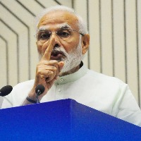We'll keep working for Assam's progress: Modi