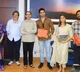 Maharashtra CM Udhav Thackeray gifts a book to Adivi Sesh