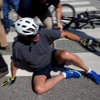 Biden falls down while getting off bike, says 'am fine'