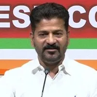 Revanth Reddy demands KTR to solve Basara IIIT students problems
