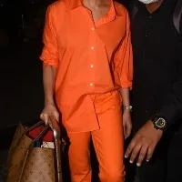 Deepika Padukone returns from Hyderabad seen at airport in orange look with sunglasses