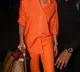 Deepika Padukone returns from Hyderabad seen at airport in orange look with sunglasses