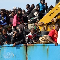 18 dead in stampede while crossing into Spanish enclave