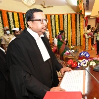 Justice Ujjal Bhuyan takes oath as Telangana HC Chief Justice