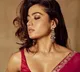 Rashmika sends Netizens into a tizzy as she sizzles in red saree