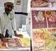 UP man sells chicken wrapped in paper with pictures of Hindu deities arrested
