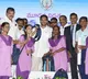 jagan pose to photographers with a school bag on his shoulders