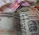 The value of rupee to another historic low per dollar