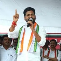 revanth reddy writes a letter to loksabha speaker om birla over national emblem inauguration on new parliament building