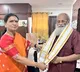 bjp leader dk aruna greets KV Vijayendra Prasad