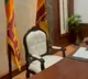 Sri Lankan military personnel guard the Prime Minister chair in his office