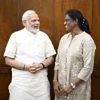 pm modi post his photo with pt usha in parliament