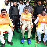 chandrababu wears life jacker in flood affected areas