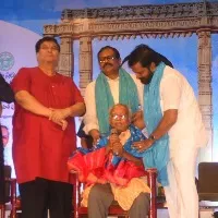 ts minister handed over dasarathi award to venu sankoju