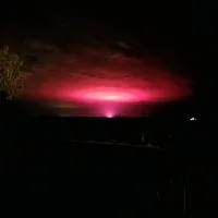 Australian town glows with pink light in the sky