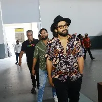 Allu Arjun spotted with new look at an ad film shooting by Trivikram Srinivas