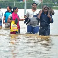 Flood affected people in Andhra Pradesh vacating their homes