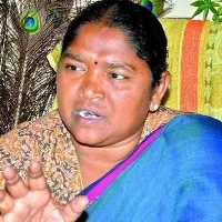 mulugu mla seethakka distributes essentials to flood victims
