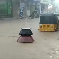Biryani pots float away in flood waters