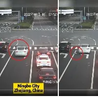 Little girl falls out of car window at busy junction