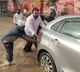 MLA Kotam Reddy helps to push vehicles stranded in rain water