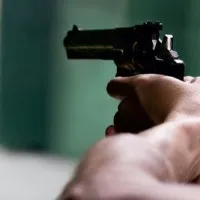 miscreants fired three rounds on a realtor in Munugode nalgonda dist