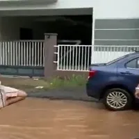 Mud bath Yoga in potholes Kerala mans unique protest against poor roads