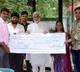 ysrcpp leader vijay sai reddy handed 10 lacks rupees cheque to journlaist welfare
