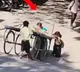 Two children who pushed the cart of fruits to help the woman Here is the video