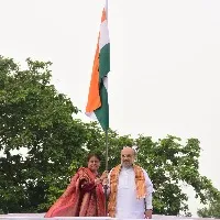 Amit shah hoists National flag at home