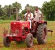 bandi sanjay rides a tractor in his padayatra